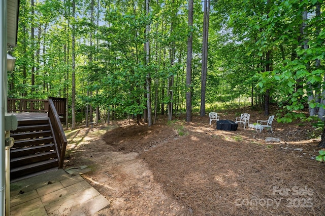 109 Braxton Gate Ct, Mount Holly, NC 28120 - view of yard featuring a wooden deck and stairs