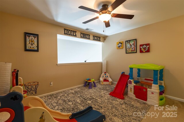 3186 Helmsley Ct, Concord, NC 28027 - recreation room featuring carpet flooring, ceiling fan, visible vents, and baseboards