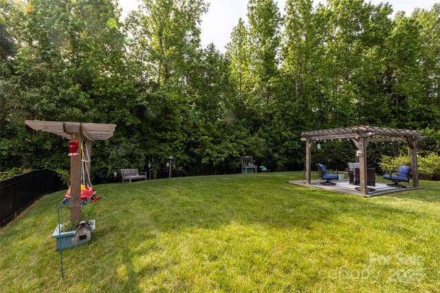 3186 Helmsley Ct, Concord, NC 28027 - view of yard with a pergola, fence, and a patio