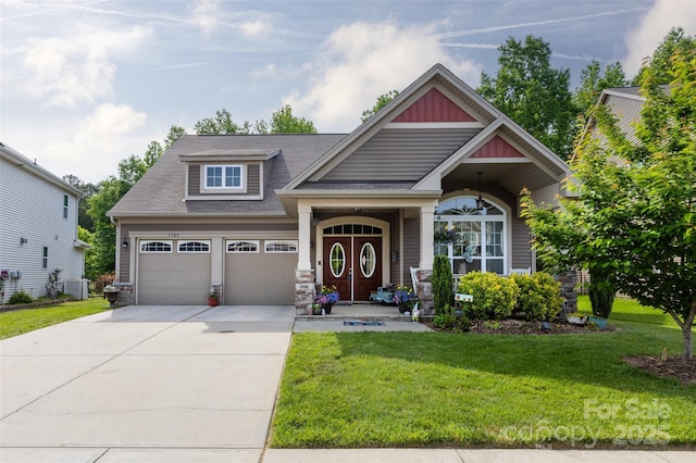 3186 Helmsley Ct, Concord, NC 28027 - craftsman house with board and batten siding, a front yard, a garage, central AC, and concrete driveway