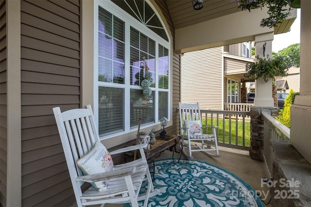 3186 Helmsley Ct, Concord, NC 28027 - balcony featuring a porch