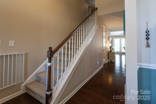 3186 Helmsley Ct, Concord, NC 28027 - stairs with wood-type flooring and baseboards