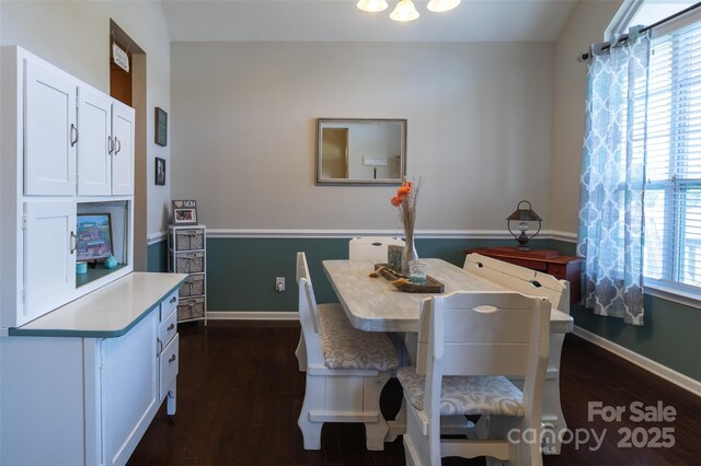 3186 Helmsley Ct, Concord, NC 28027 - dining room featuring baseboards and dark wood-style floors