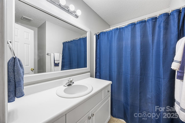 311 Masters Dr, Rock Hill, SC 29732 - bathroom featuring a textured ceiling and vanity