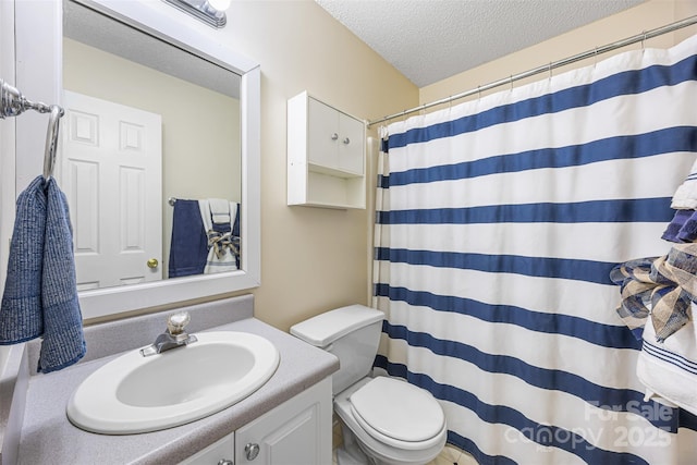 311 Masters Dr, Rock Hill, SC 29732 - bathroom featuring a textured ceiling, vanity, toilet, and a shower with curtain