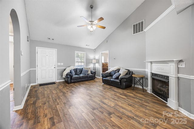 311 Masters Dr, Rock Hill, SC 29732 - living room with ceiling fan, dark wood-style floors, arched walkways, a fireplace, and high vaulted ceiling