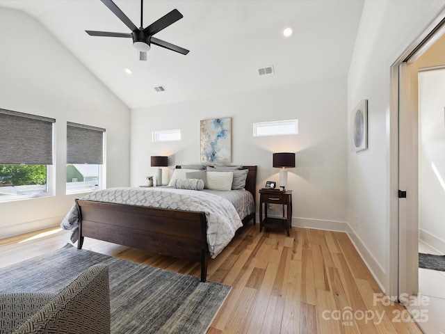 bedroom featuring recessed lighting, vaulted ceiling, light wood-type flooring, and visible vents