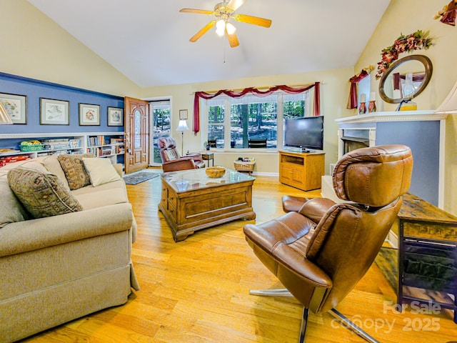 164 Forest Ridge Dr, Rutherfordton, NC 28139 - living room featuring a ceiling fan, plenty of natural light, lofted ceiling, and light wood-style floors
