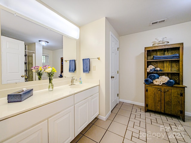 164 Forest Ridge Dr, Rutherfordton, NC 28139 - full bathroom featuring baseboards, visible vents, tile patterned flooring, and vanity