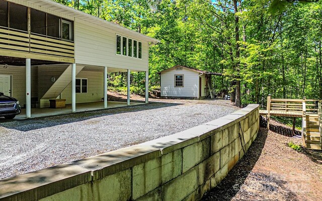164 Forest Ridge Dr, Rutherfordton, NC 28139 - view of side of property with a carport, an outbuilding, and a storage unit