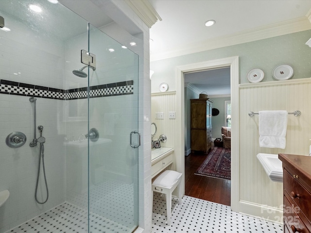 full bath featuring ornamental molding, ensuite bath, a shower stall, and vanity