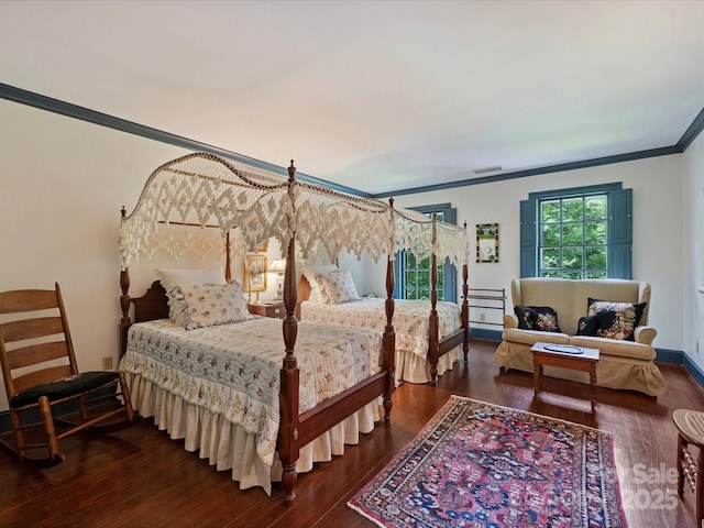 bedroom featuring crown molding and hardwood / wood-style floors