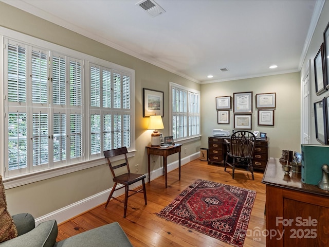 sitting room with crown molding, recessed lighting, wood finished floors, baseboards, and a desk