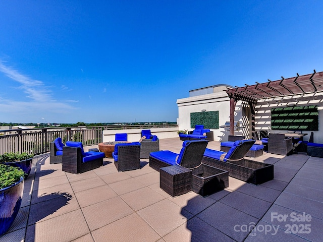 view of patio / terrace featuring outdoor lounge area and a pergola