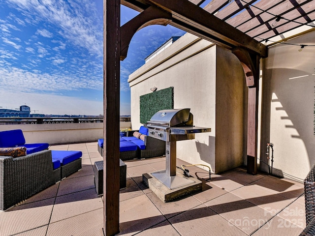 view of patio with an outdoor living space, grilling area, and a pergola