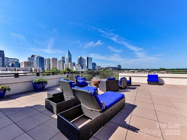 view of patio / terrace featuring a view of city