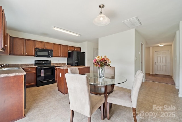 dining area featuring visible vents
