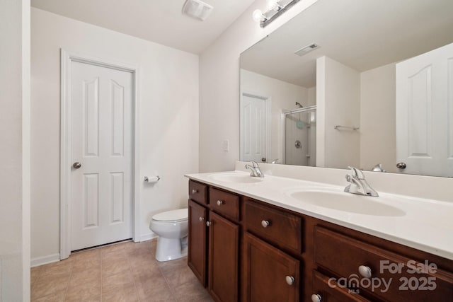 full bathroom featuring visible vents, a sink, a stall shower, and toilet