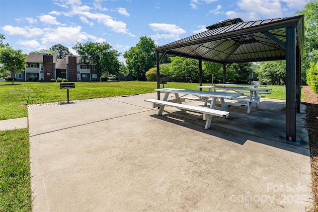 surrounding community featuring a gazebo and a lawn