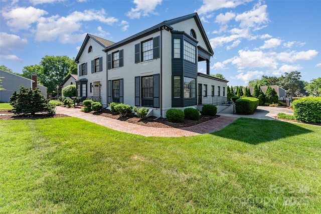 view of home's exterior featuring a lawn