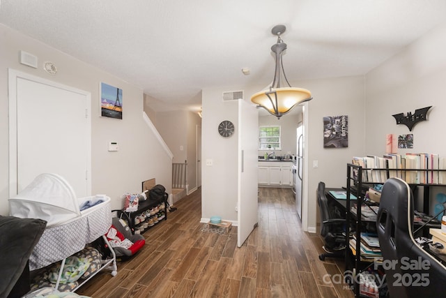 office with wood finished floors and baseboards