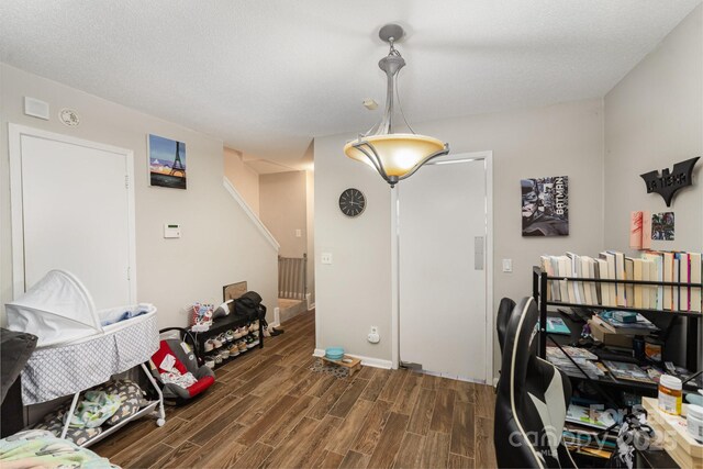 office featuring dark wood-style floors and baseboards