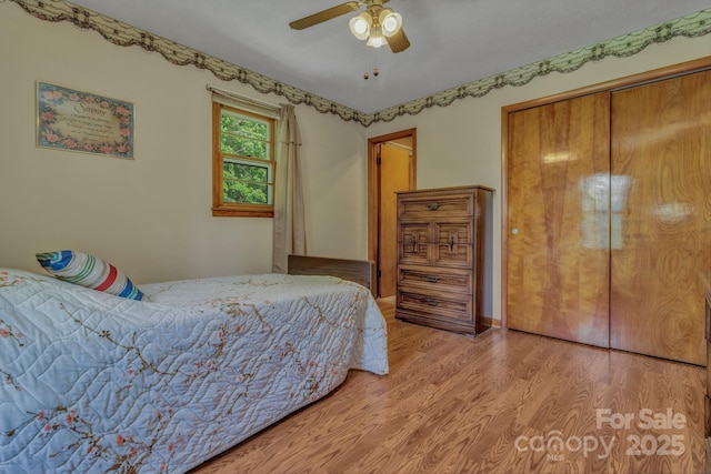 676 Arrowhead Trl Unit 6, Marion, NC 28752 - bedroom featuring wood finished floors, a closet, and ceiling fan