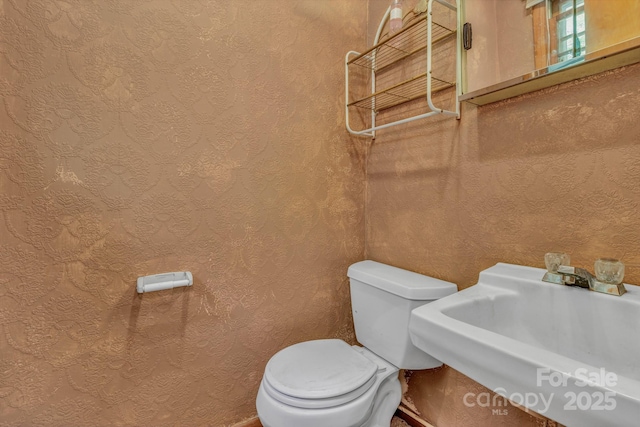 676 Arrowhead Trl Unit 6, Marion, NC 28752 - bathroom featuring a sink and toilet