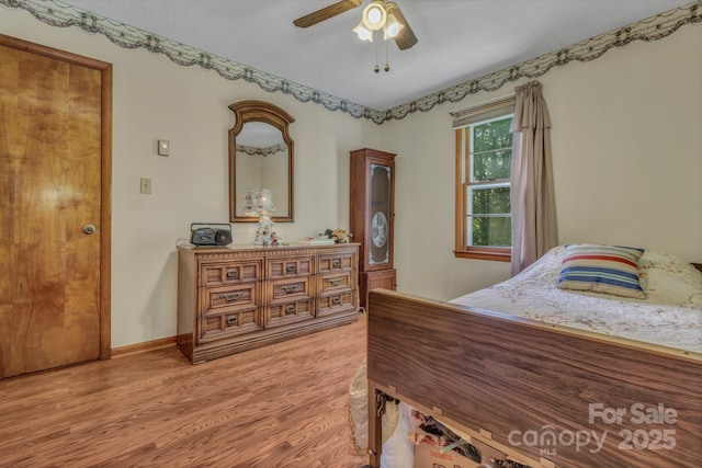 676 Arrowhead Trl Unit 6, Marion, NC 28752 - bedroom with light wood-style floors, baseboards, and ceiling fan