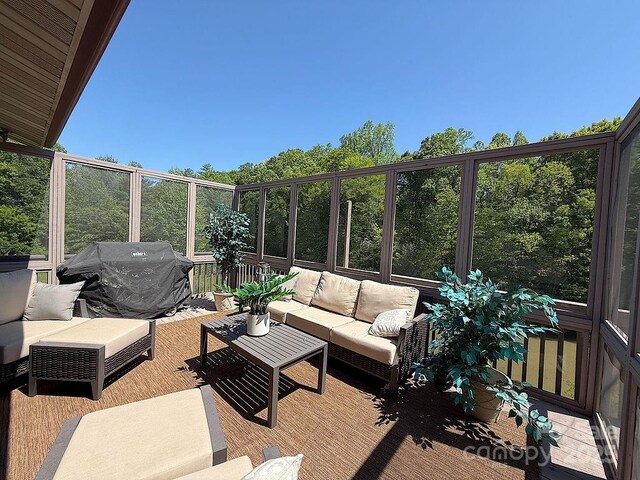 sunroom / solarium with an outdoor living space