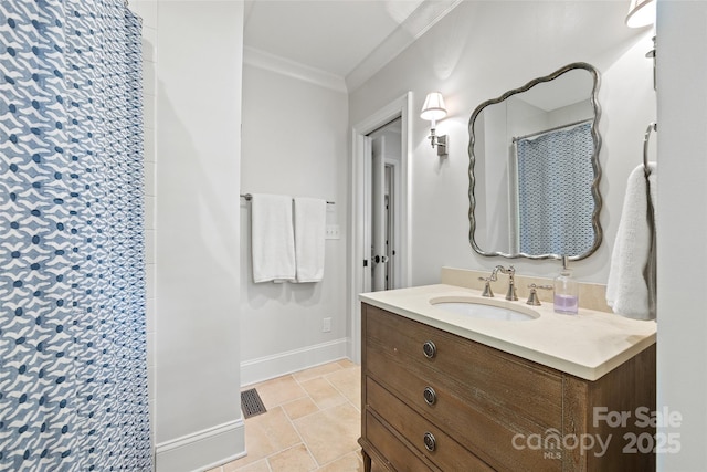 full bath featuring ornamental molding, vanity, baseboards, and a shower with shower curtain