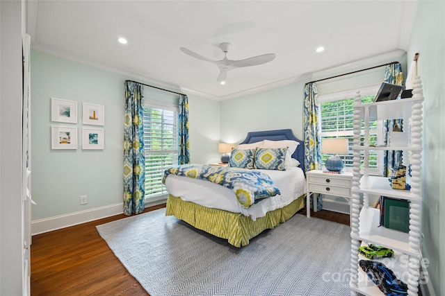 bedroom featuring wood finished floors, baseboards, recessed lighting, and ceiling fan