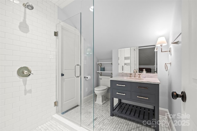 full bathroom with a stall shower, vanity, baseboards, toilet, and tile patterned floors