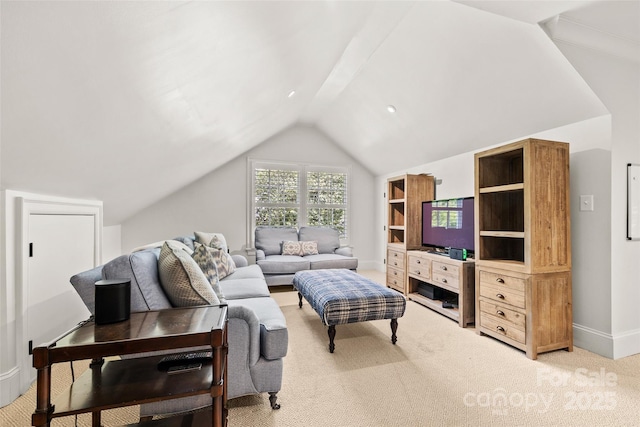living room featuring lofted ceiling, light colored carpet, and baseboards