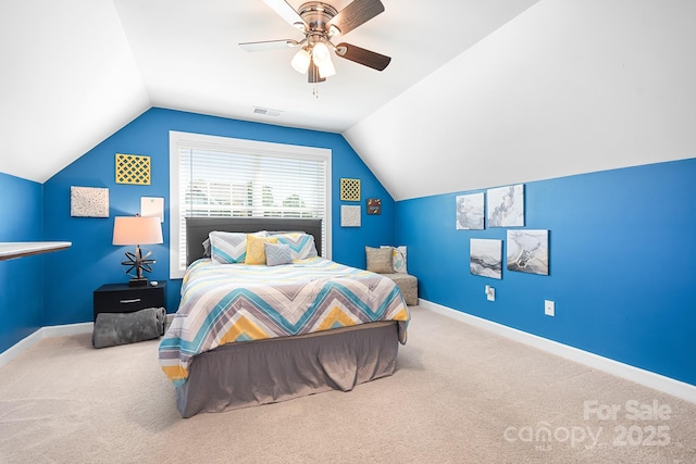 bedroom with lofted ceiling, carpet flooring, a ceiling fan, and baseboards