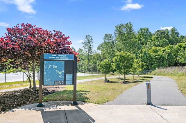 view of community featuring a lawn