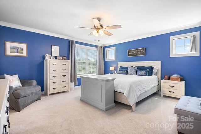 13359 Caite Ridge Rd, Davidson, NC 28036 - bedroom featuring light colored carpet, ornamental molding, and ceiling fan