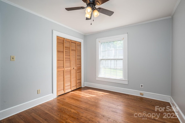 406 Arrowood St SE, Lenoir, NC 28645 - unfurnished bedroom featuring baseboards and crown molding