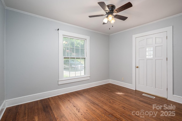 406 Arrowood St SE, Lenoir, NC 28645 - foyer entrance with baseboards, dark wood-style floors, and ornamental molding