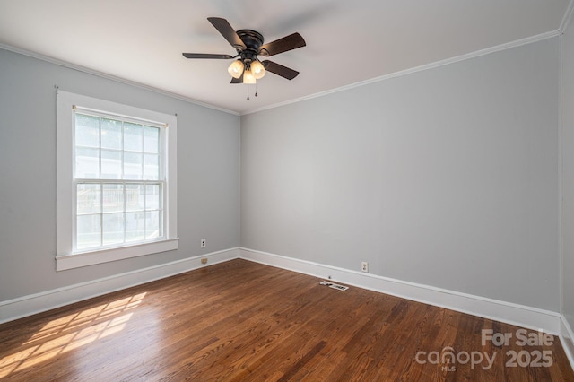 406 Arrowood St SE, Lenoir, NC 28645 - empty room with crown molding, visible vents, baseboards, ceiling fan, and dark wood-style floors