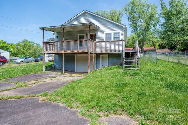 406 Arrowood St SE, Lenoir, NC 28645 - exterior space with stairs, a wooden deck, and fence