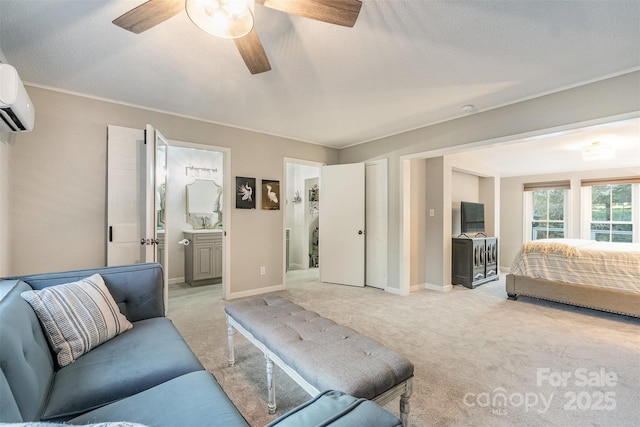 317 Commodore Loop, Mooresville, NC 28117 - bedroom featuring a wall unit AC, light carpet, baseboards, and a ceiling fan
