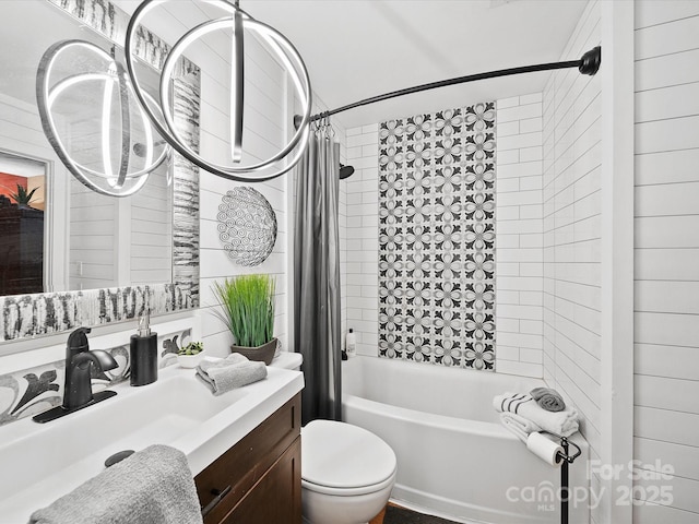 full bath with shower / bath combo with shower curtain, toilet, and vanity