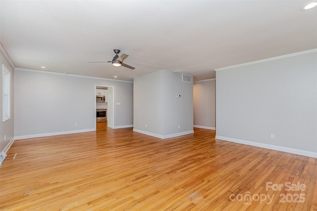 6007 Charing Pl, Charlotte, NC 28211 - spare room with a ceiling fan, light wood-type flooring, crown molding, baseboards, and recessed lighting