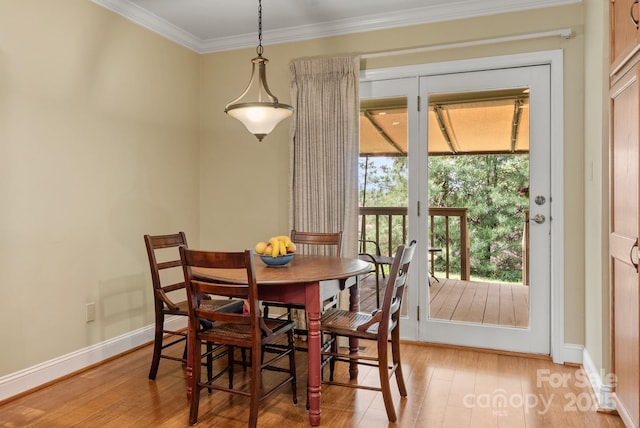120 Cloverleaf Ln, Asheville, NC 28803 - dining room featuring light wood-style flooring and ornamental molding