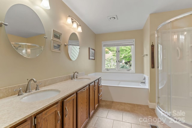 120 Cloverleaf Ln, Asheville, NC 28803 - full bath with a shower stall, a garden tub, double vanity, and tile patterned floors