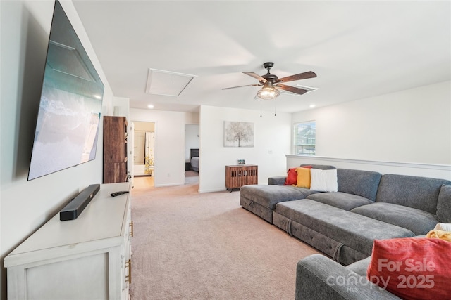 living room with light colored carpet, attic access, a ceiling fan, and recessed lighting