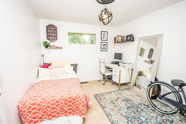 bedroom with baseboards and carpet flooring