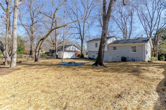 view of yard featuring central AC