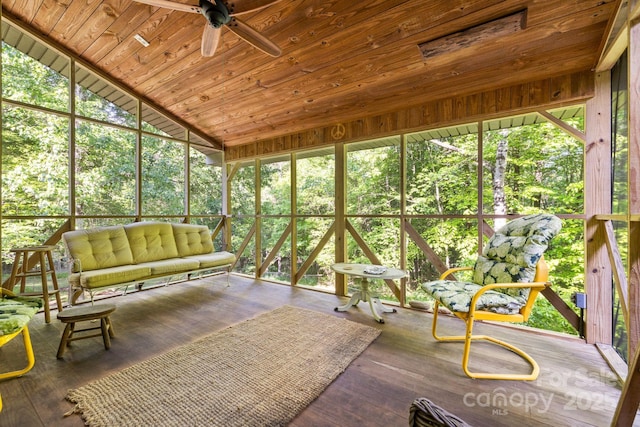 unfurnished sunroom with a ceiling fan